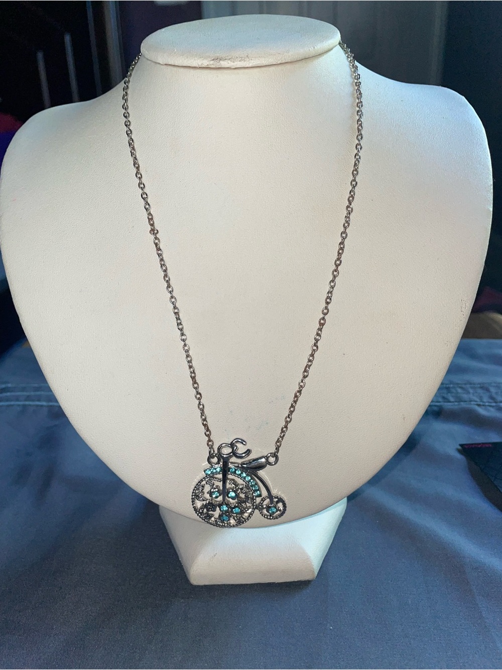 Silver-Tone Bicycle Pendant Necklace with Teal Crystals